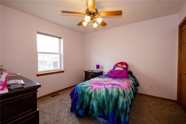 11295 County Road 366, Savannah, MO 64485 - carpeted bedroom with baseboards, visible vents, and ceiling fan