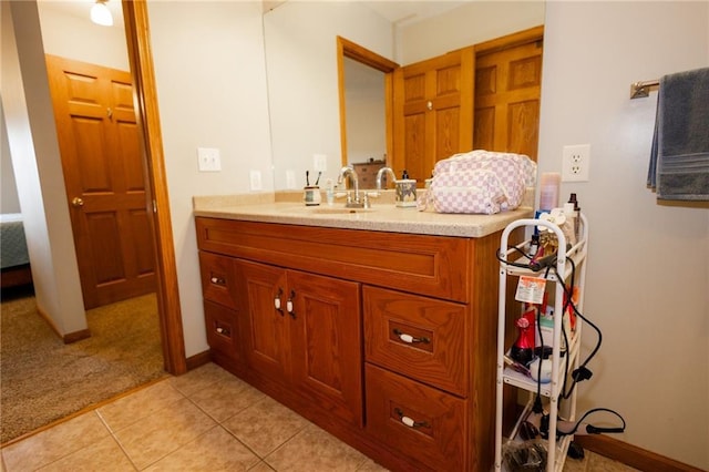11295 County Road 366, Savannah, MO 64485 - bathroom featuring baseboards, tile patterned flooring, and vanity