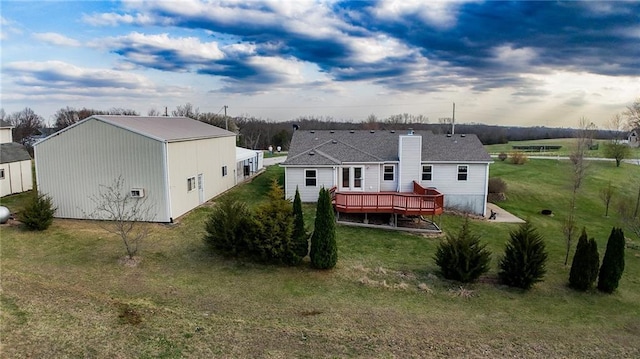 11295 County Road 366, Savannah, MO 64485 - rear view of property with a lawn and a deck