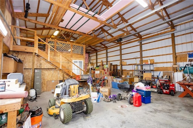11295 County Road 366, Savannah, MO 64485 - garage featuring a workshop area and metal wall