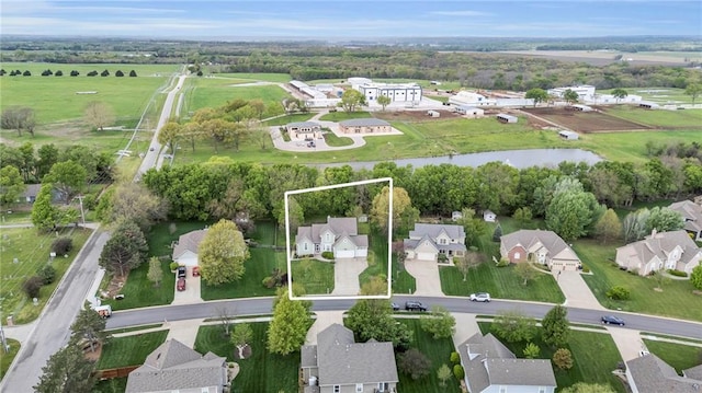 aerial view with a water view and a residential view