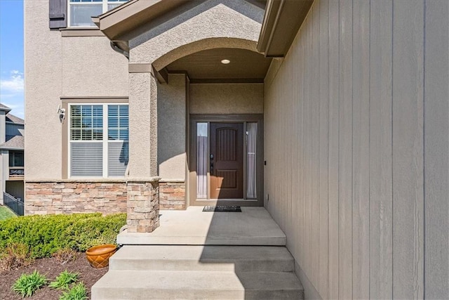 11194 S Hastings St, Olathe, KS 66061 - entrance to property featuring stucco siding and stone siding