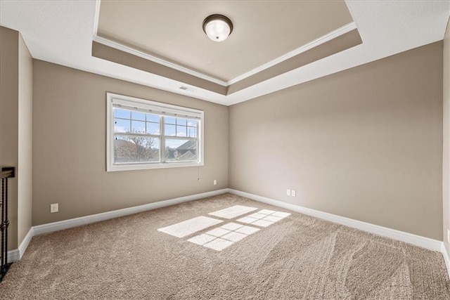 11194 S Hastings St, Olathe, KS 66061 - carpeted spare room featuring baseboards, visible vents, ornamental molding, and a raised ceiling