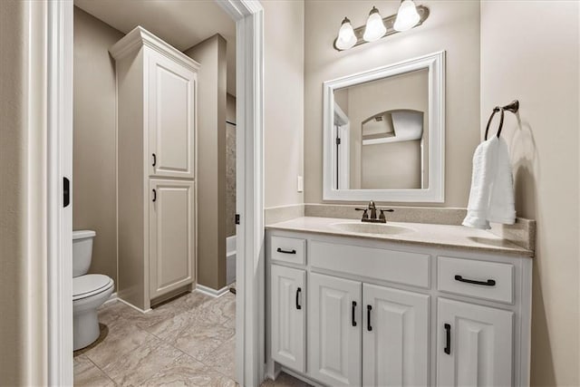 11194 S Hastings St, Olathe, KS 66061 - bathroom featuring vanity, toilet, and marble finish floor