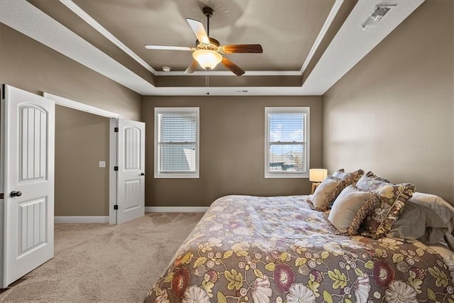 11194 S Hastings St, Olathe, KS 66061 - carpeted bedroom featuring baseboards, visible vents, ceiling fan, and a raised ceiling