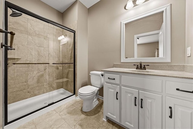 11194 S Hastings St, Olathe, KS 66061 - bathroom with vanity, toilet, baseboards, and a stall shower
