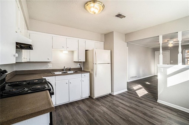 3552 S Lynn St, Independence, MO 64055 - kitchen featuring a sink, electric range oven, freestanding refrigerator, under cabinet range hood, and visible vents