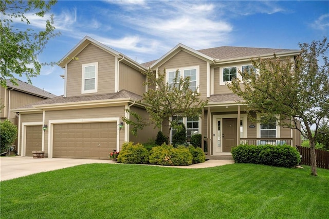 view of front facade with driveway, a shingled roof, a front yard, and a garage