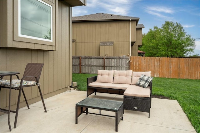 view of patio featuring a fenced backyard and outdoor lounge area