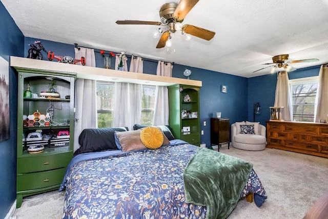 bedroom featuring carpet and ceiling fan