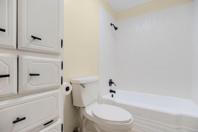 bathroom with toilet and tub / shower combination