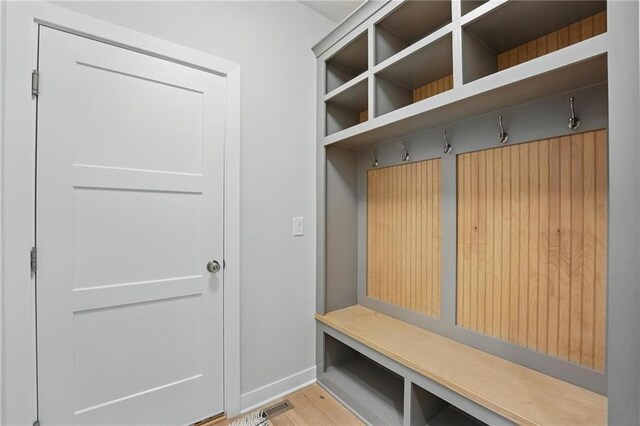 1312 NW 107th Ter, Kansas City, MO 64155 - mudroom featuring light wood-style flooring and baseboards