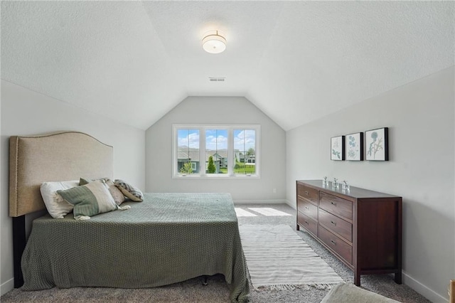1312 NW 107th Ter, Kansas City, MO 64155 - bedroom with baseboards, carpet floors, and lofted ceiling