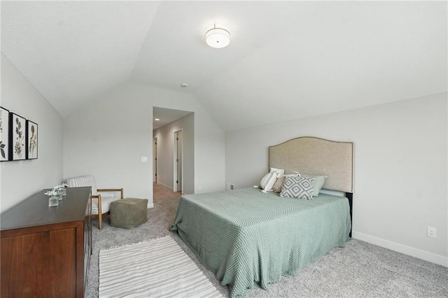 1312 NW 107th Ter, Kansas City, MO 64155 - carpeted bedroom with vaulted ceiling and baseboards