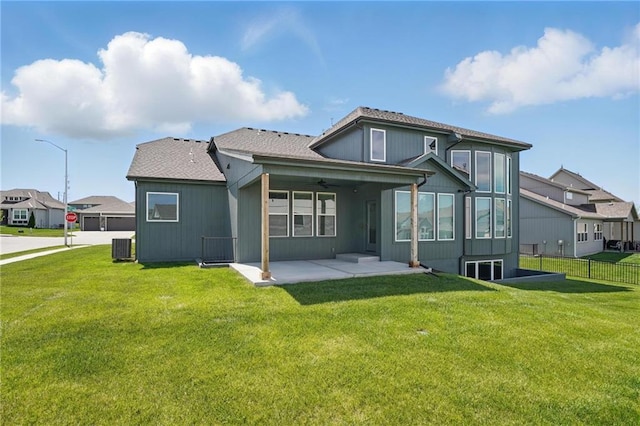 1312 NW 107th Ter, Kansas City, MO 64155 - back of property with a patio, a ceiling fan, and central air condition unit