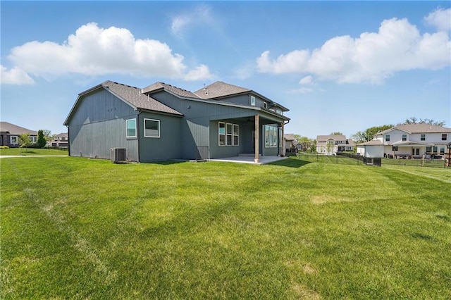 1312 NW 107th Ter, Kansas City, MO 64155 - back of house featuring a patio and cooling unit