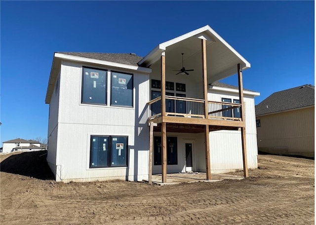 2319 SW Serena Pl, Lees Summit, MO 64082 - rear view of house featuring a ceiling fan