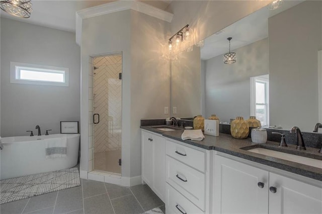 2303 SW Serena Pl, Lees Summit, MO 64082 - full bathroom featuring double vanity, healthy amount of natural light, a stall shower, and a soaking tub