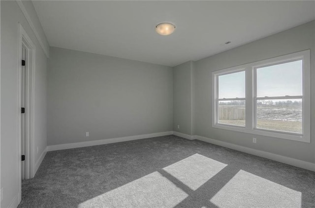 2303 SW Serena Pl, Lees Summit, MO 64082 - empty room featuring carpet flooring and baseboards