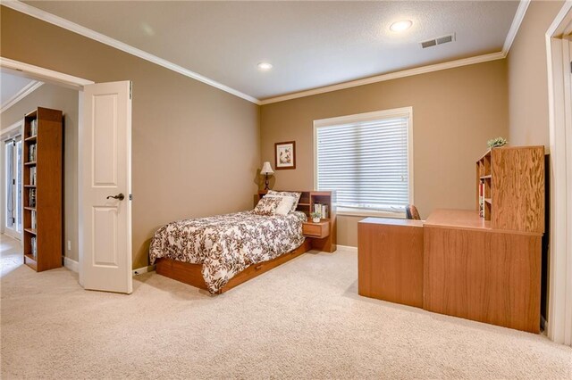 bedroom with carpet flooring, baseboards, and ornamental molding