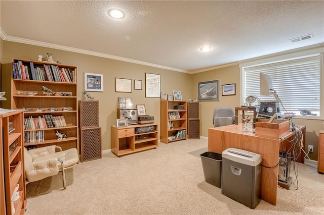 office with a textured ceiling, visible vents, baseboards, ornamental molding, and light carpet