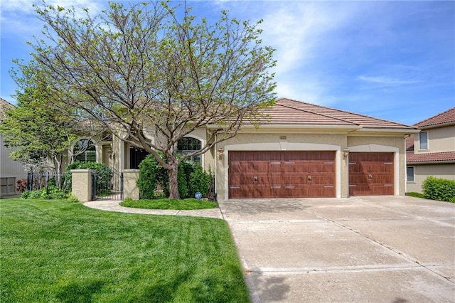 single story home featuring a front lawn, a garage, stucco siding, concrete driveway, and a tiled roof