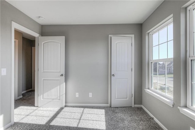 6022 NE 118th Ter, Kansas City, MO 64156 - unfurnished bedroom with carpet and baseboards