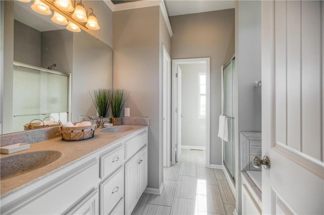 6022 NE 118th Ter, Kansas City, MO 64156 - full bathroom featuring a sink, double vanity, baseboards, and a shower stall