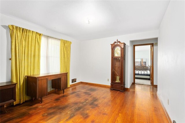 9382 N Cookingham Dr, Kansas City, MO 64157 - interior space featuring baseboards, wood finished floors, and visible vents