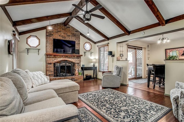 5103 S Shrank Ave, Independence, MO 64055 - living room with ceiling fan, lofted ceiling with beams, wood finished floors, and a fireplace
