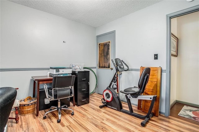 5103 S Shrank Ave, Independence, MO 64055 - office with a textured ceiling and wood finished floors