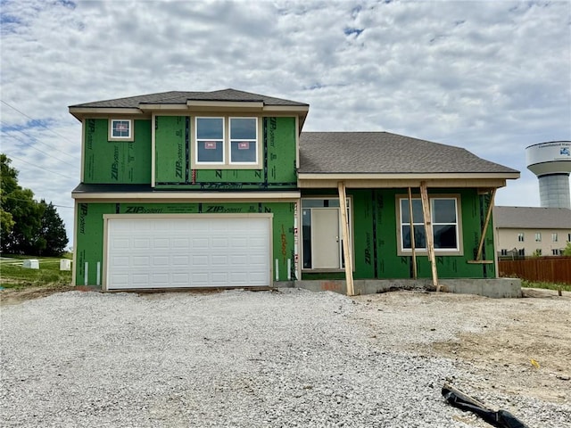 15501 Lakeside Dr, Basehor, KS 66007 - property under construction featuring an attached garage and driveway