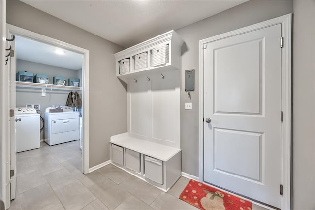 4246 Lakeview Ter, Basehor, KS 66007 - mudroom featuring separate washer and dryer and baseboards
