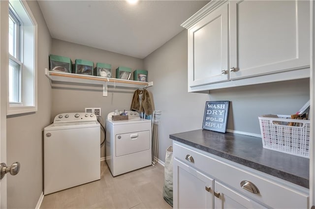 4246 Lakeview Ter, Basehor, KS 66007 - clothes washing area with washing machine and dryer, baseboards, and cabinet space