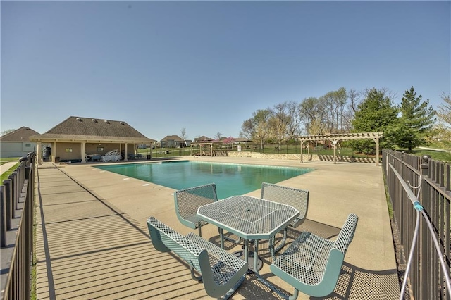 4246 Lakeview Ter, Basehor, KS 66007 - pool featuring a pergola, a patio area, and fence