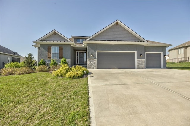 4246 Lakeview Ter, Basehor, KS 66007 - craftsman-style home with fence, concrete driveway, stone siding, a front yard, and a garage