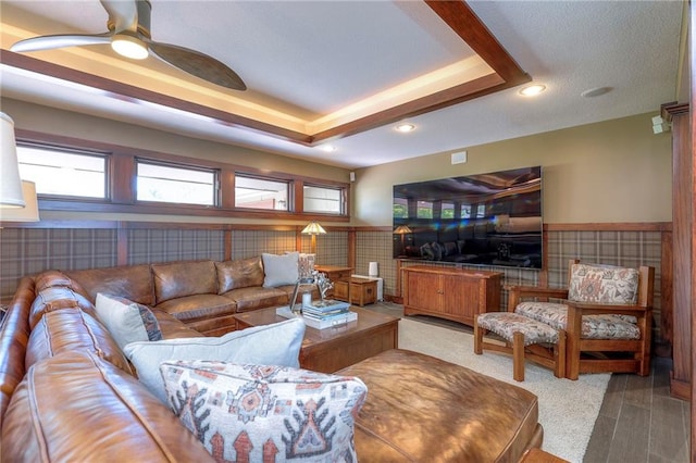 101 Algonquin Dr, Lake Winnebago, MO 64034 - living room featuring wainscoting, a ceiling fan, recessed lighting, and a raised ceiling