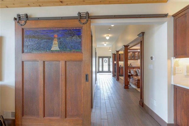 101 Algonquin Dr, Lake Winnebago, MO 64034 - hall featuring dark wood-type flooring and baseboards