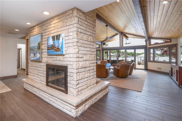 101 Algonquin Dr, Lake Winnebago, MO 64034 - living area with baseboards, wood finished floors, recessed lighting, a stone fireplace, and wood ceiling