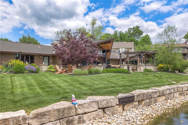 101 Algonquin Dr, Lake Winnebago, MO 64034 - back of house featuring a pergola and a lawn