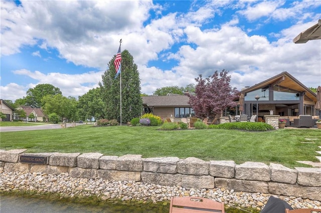 101 Algonquin Dr, Lake Winnebago, MO 64034 - rear view of property featuring a yard and a patio area