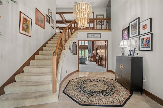 3705 W 119th Ter, Leawood, KS 66209 - tiled foyer featuring a chandelier, stairway, baseboards, and a high ceiling