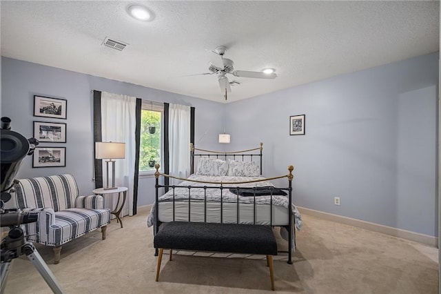 3705 W 119th Ter, Leawood, KS 66209 - bedroom featuring light colored carpet, a textured ceiling, baseboards, and a ceiling fan