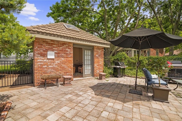 3705 W 119th Ter, Leawood, KS 66209 - view of patio featuring grilling area and fence