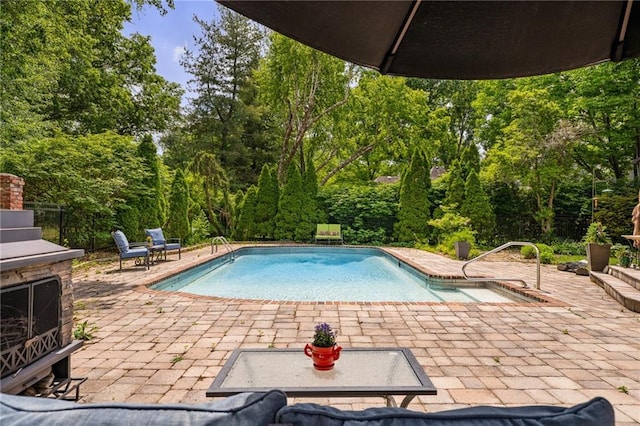 3705 W 119th Ter, Leawood, KS 66209 - swimming pool with a patio area and an outdoor brick fireplace