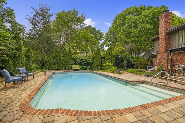 3705 W 119th Ter, Leawood, KS 66209 - outdoor pool featuring a patio