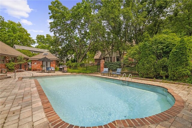 3705 W 119th Ter, Leawood, KS 66209 - view of swimming pool featuring a patio and fence