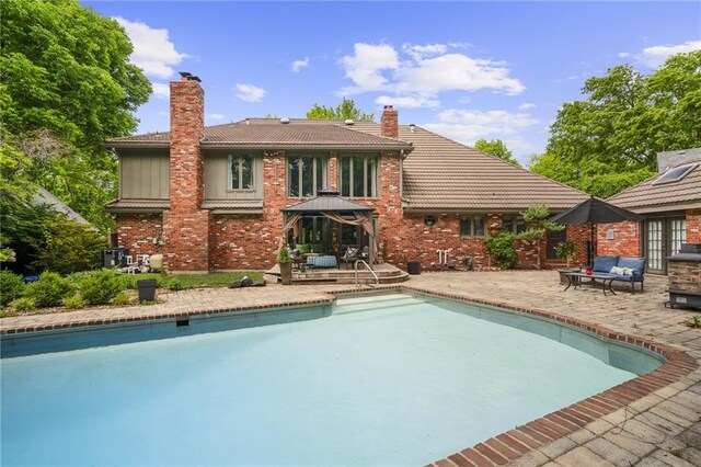 3705 W 119th Ter, Leawood, KS 66209 - outdoor pool with a patio area and an outdoor living space