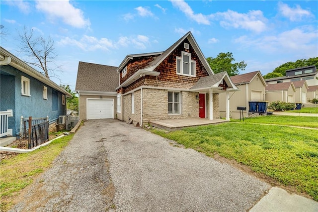 view of front of home featuring central air condition unit, aphalt driveway, a shingled roof, a front lawn, and stone siding