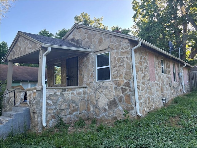 6941 Spruce Ave, Kansas City, MO 64132 - view of property exterior featuring stone siding